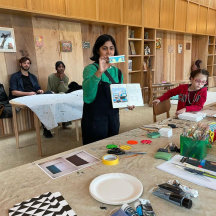 Image of a woman in a workshop making things